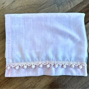 Vintage Pink Sheer Curtain Panel With Small Pink Pom Poms Decorating The Bottom